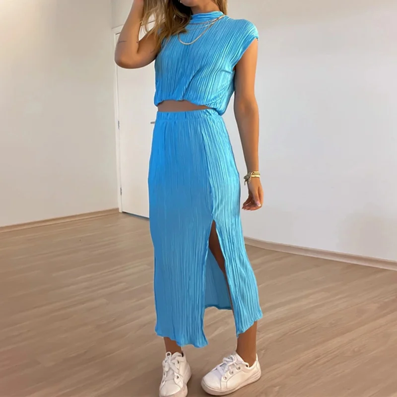 Women Pleated Half High Collar Sleeveless Top And High Waist Slit Mid Length Skirt Two-Piece Set asymmetrical skirt cut Women Pleated Half High Collar Sleeveless Top And High Waist Slit Mid Length Skirt Two-Piece Set asymmetrical skirt cut